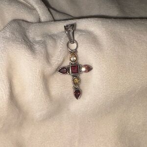 Elegant Silver and Red Gemstone Cross Pendant